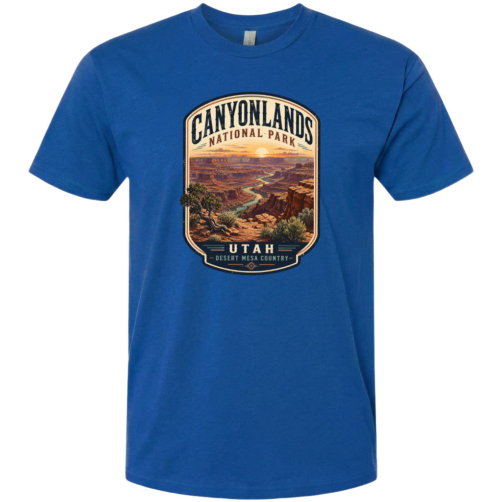 A blue t-shirt with a graphic design depicting a scenic landscape of the Canyonlands National Park in Utah.