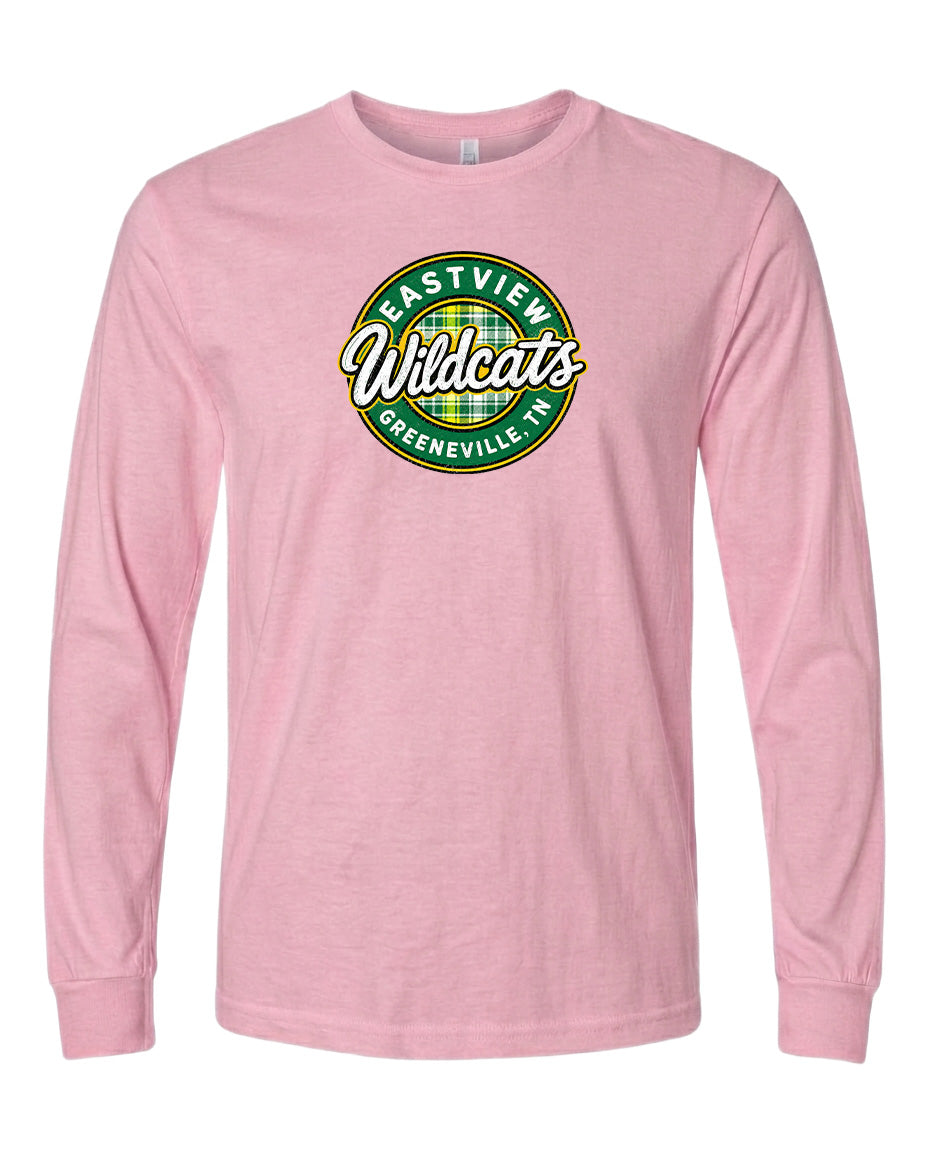 A pink long-sleeved t-shirt with a circular logo on the front.