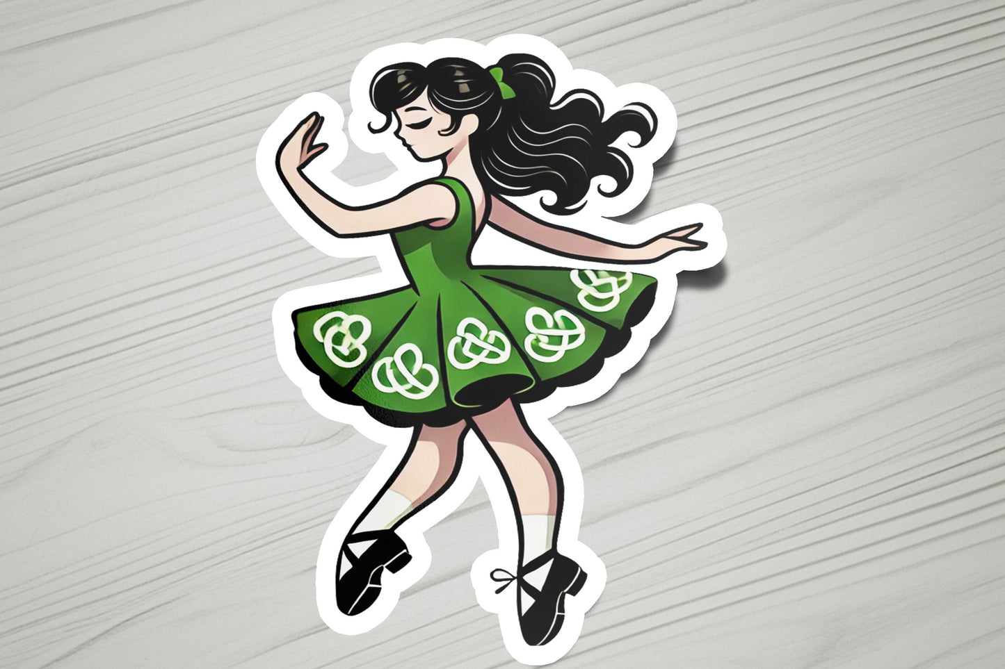 a sticker of a woman in a green dress