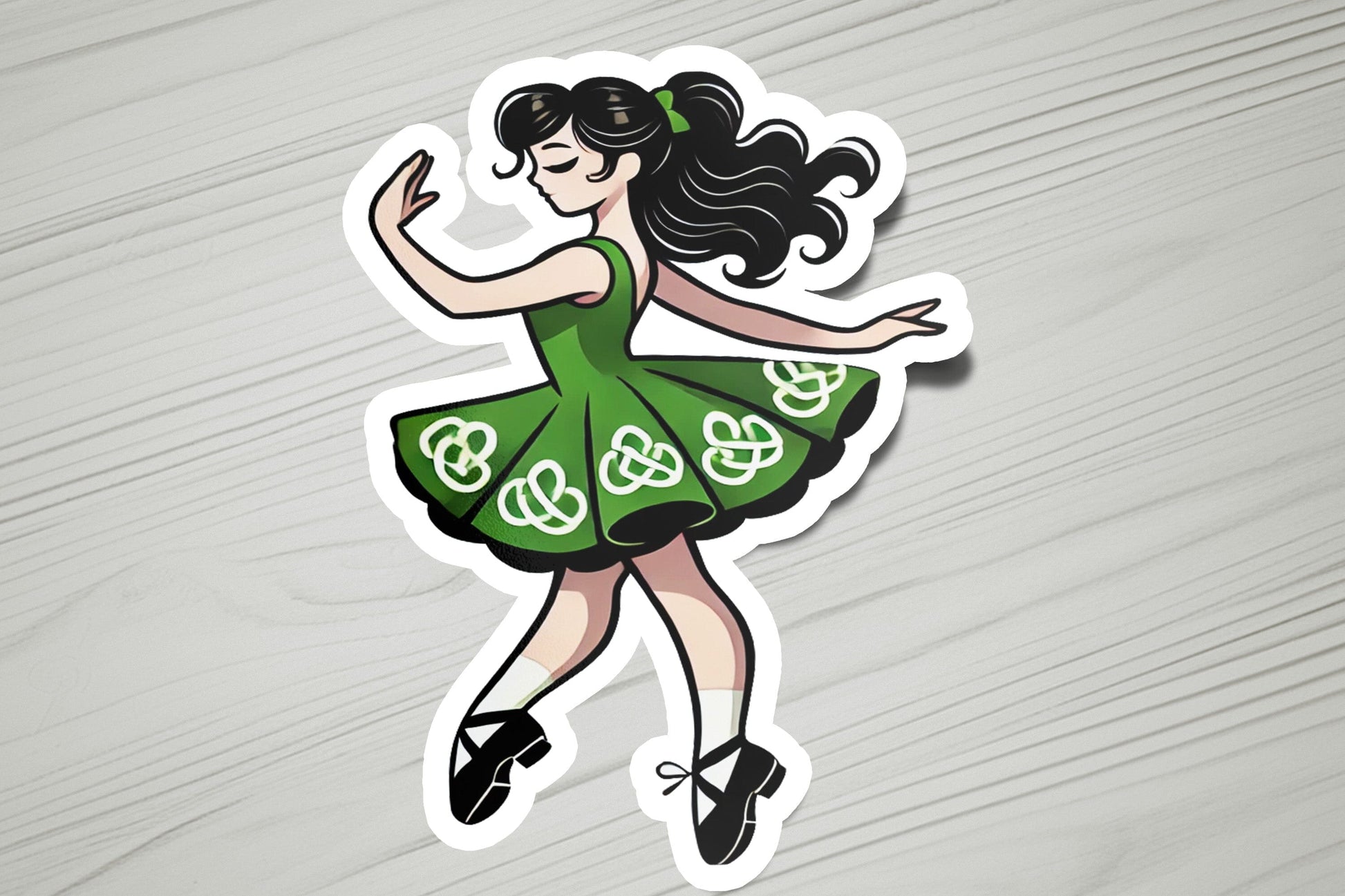 a sticker of a woman in a green dress