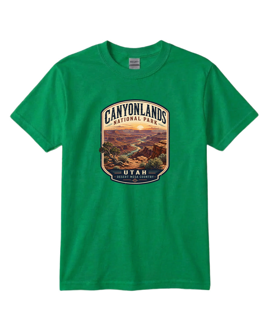 A green t-shirt with a graphic design depicting a scenic landscape, specifically the Canyonlands National Park in Utah.
