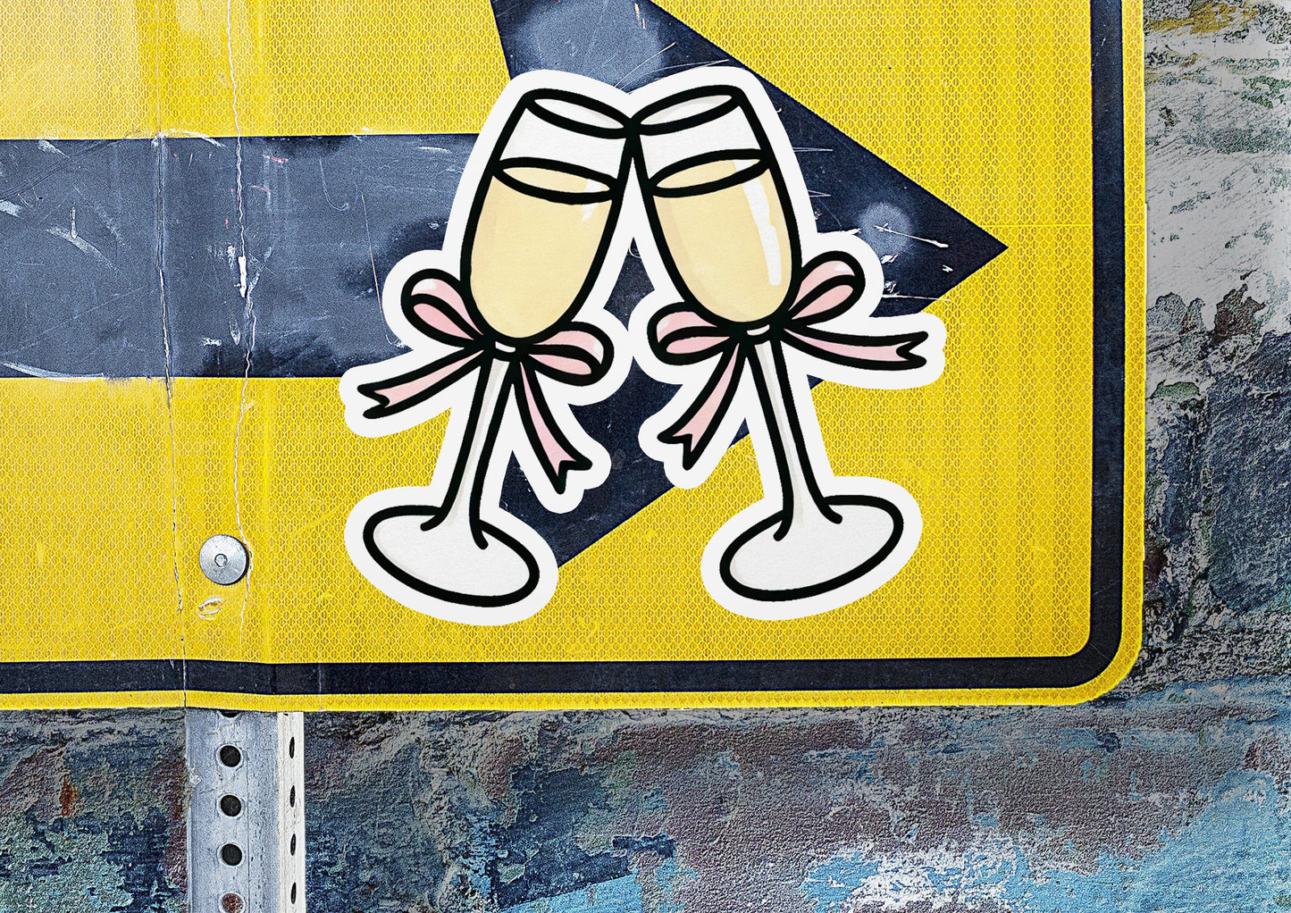 a yellow and black sign with two champagne glasses on it