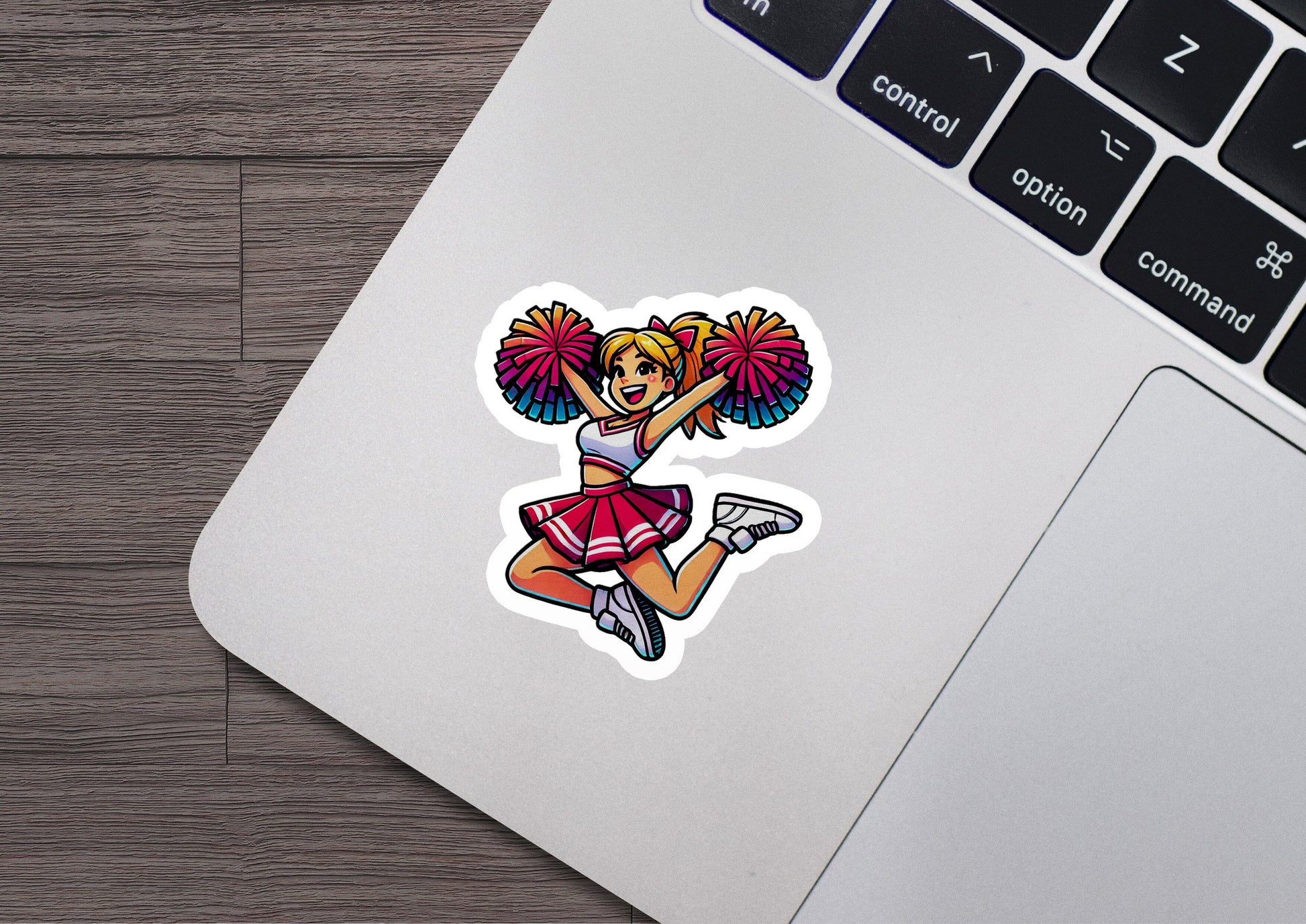 a laptop with a sticker of a cheerleader