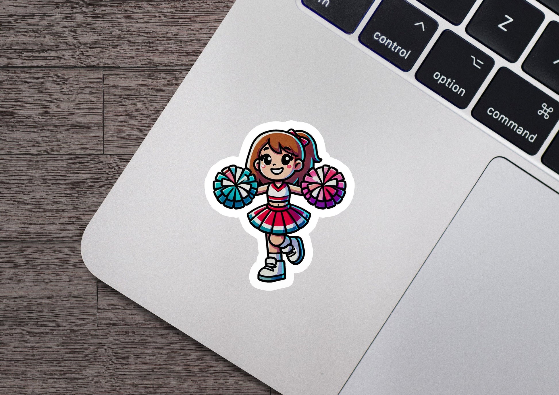 a laptop with a sticker of a girl holding a fan