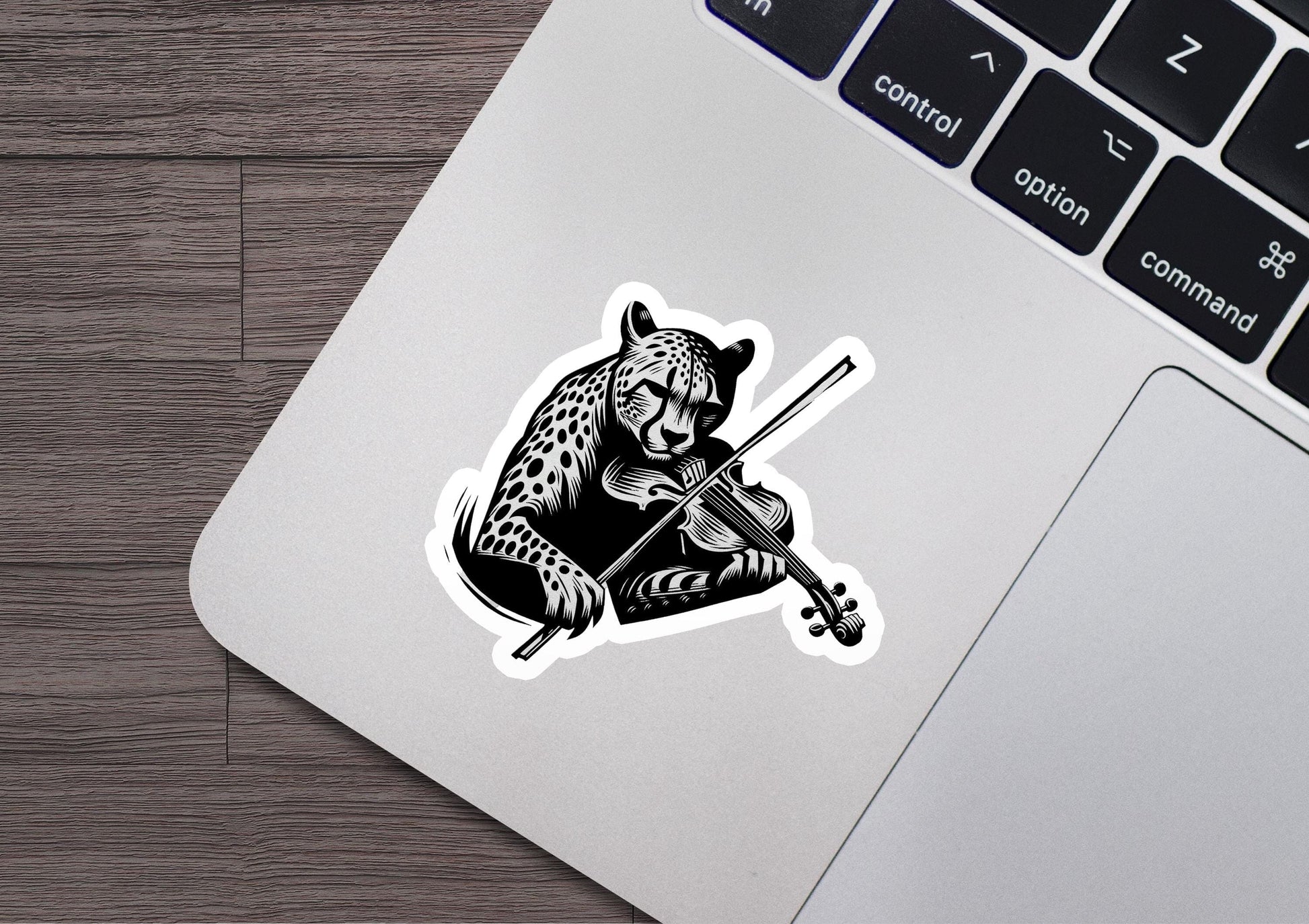 a sticker of a cheetah playing a violin