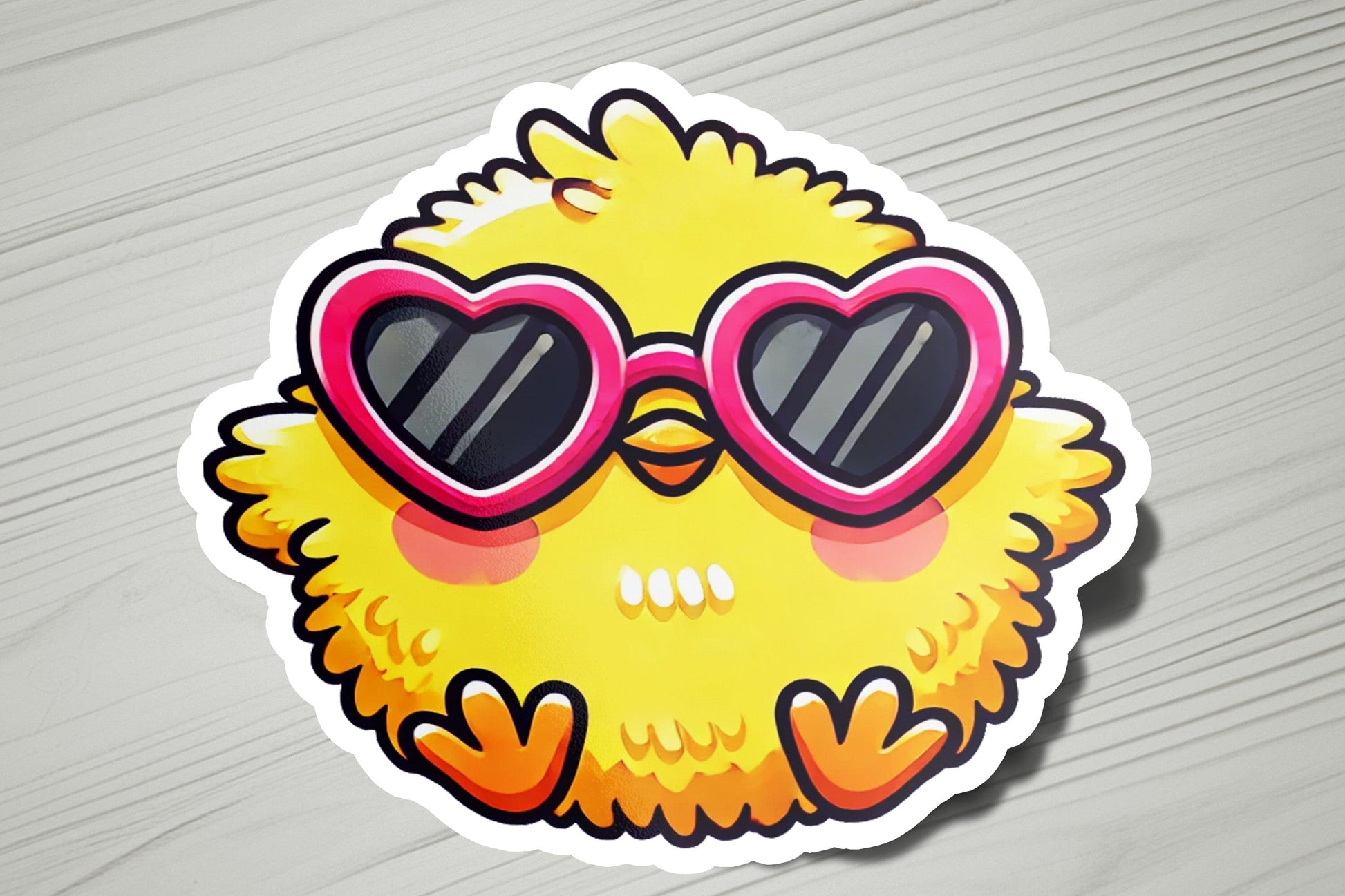 a sticker of a yellow bird with heart shaped sunglasses