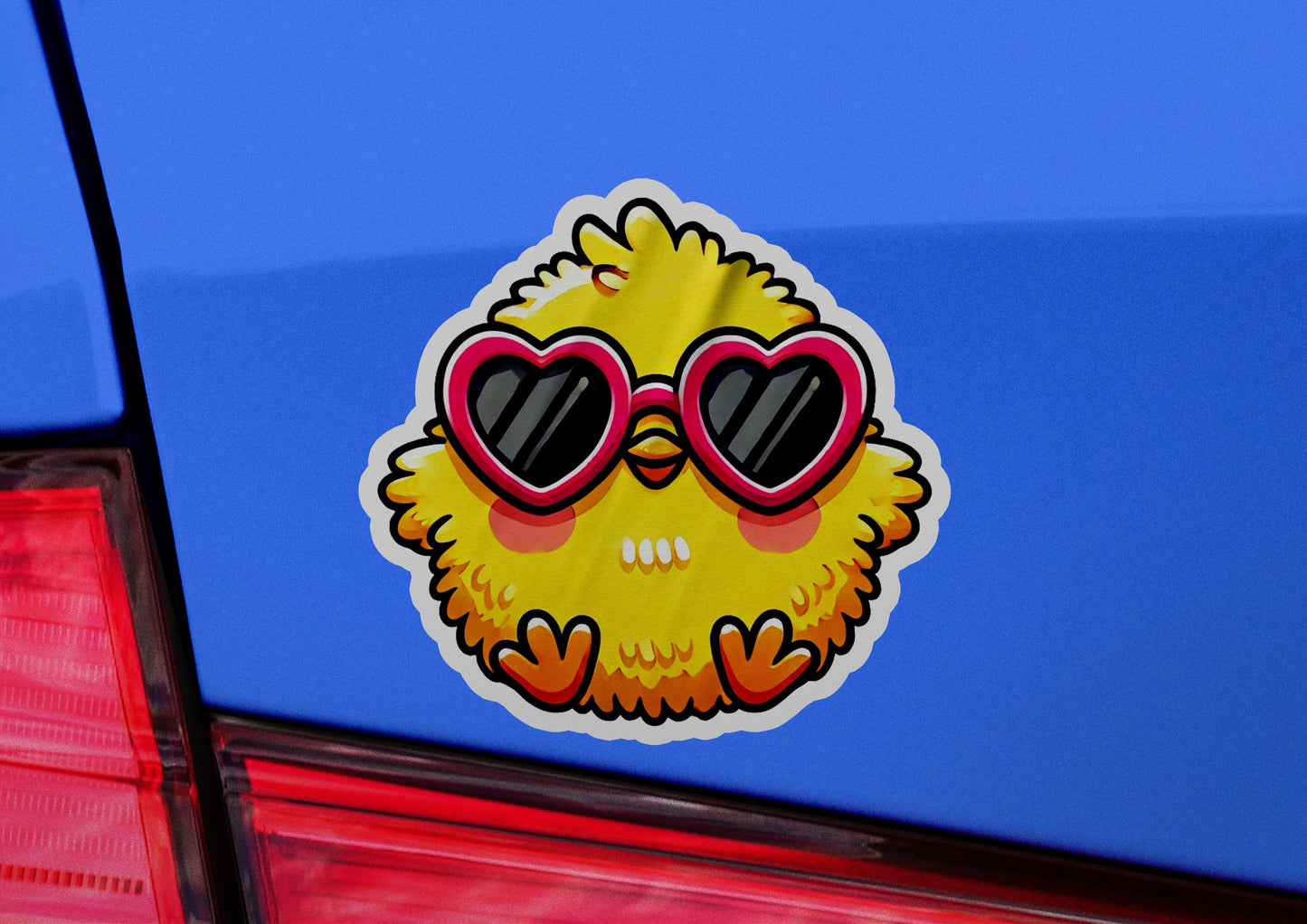 a sticker of a yellow bird with heart shaped sunglasses