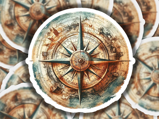 a close up of a compass on a sticker