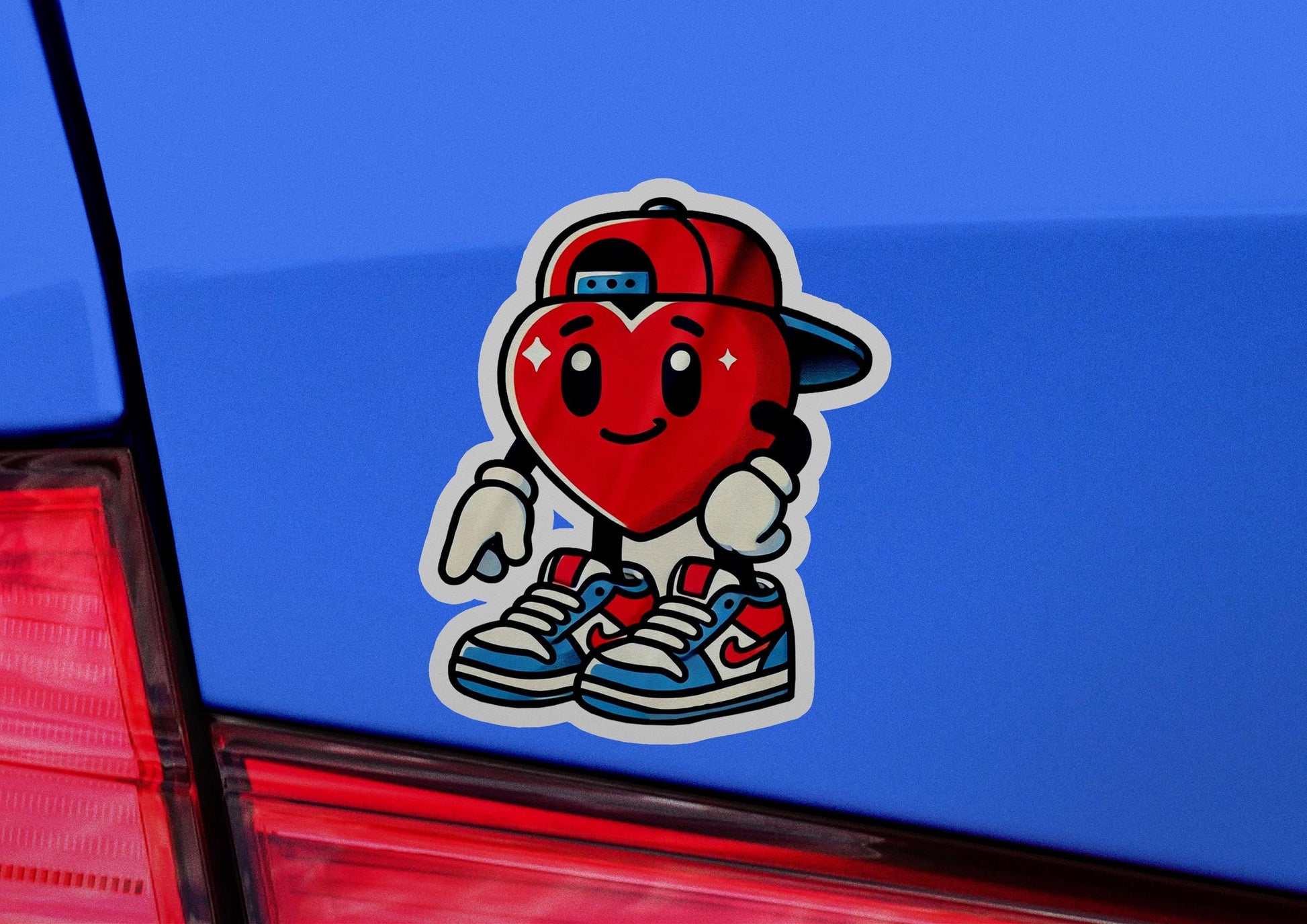 a sticker of a heart wearing a hat
