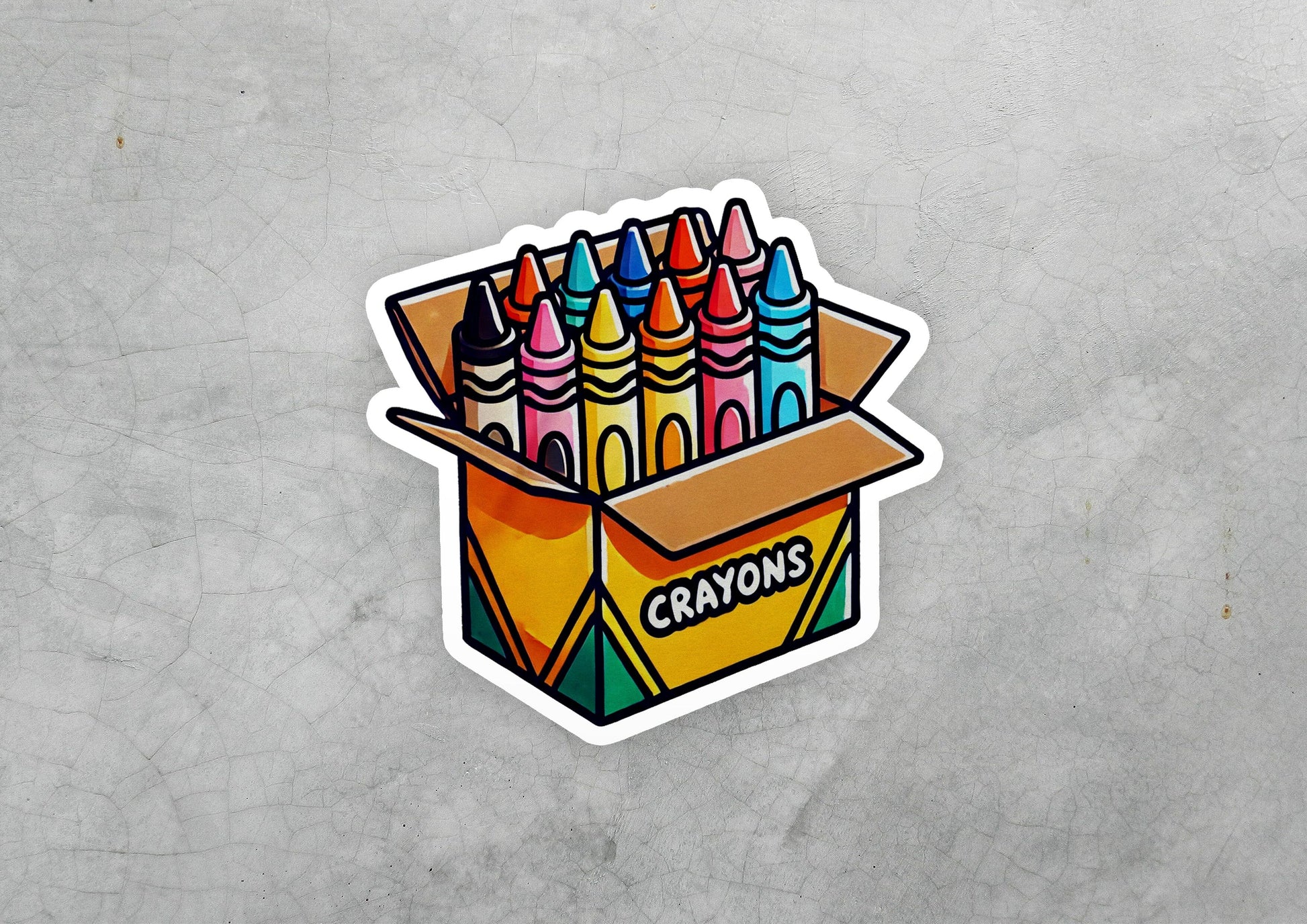 a box of crayons sticker on a concrete surface