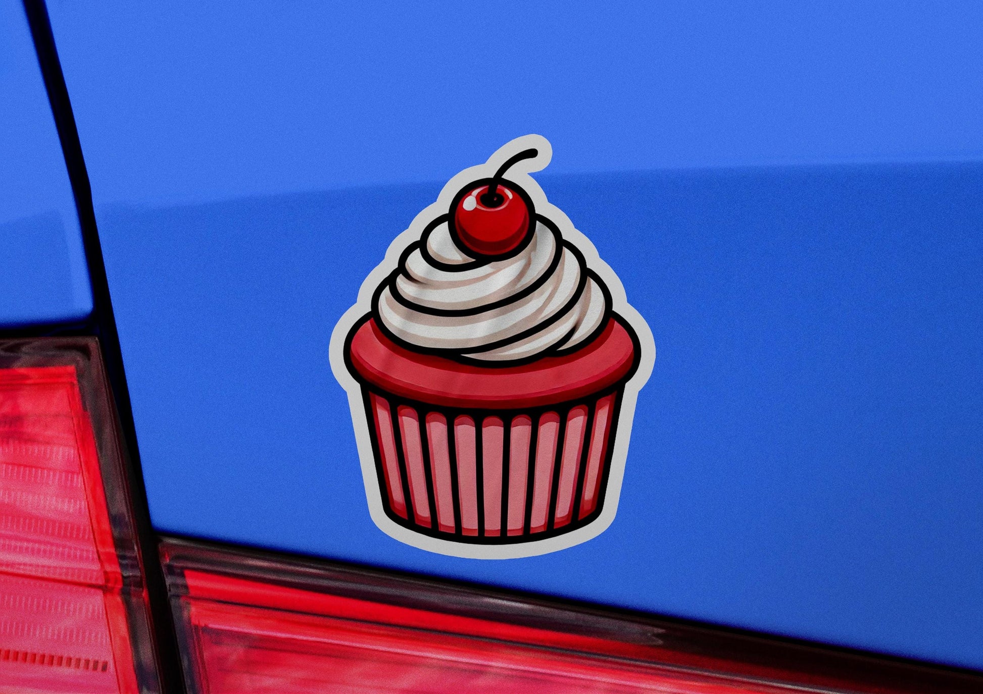 a sticker of a cupcake with a cherry on top