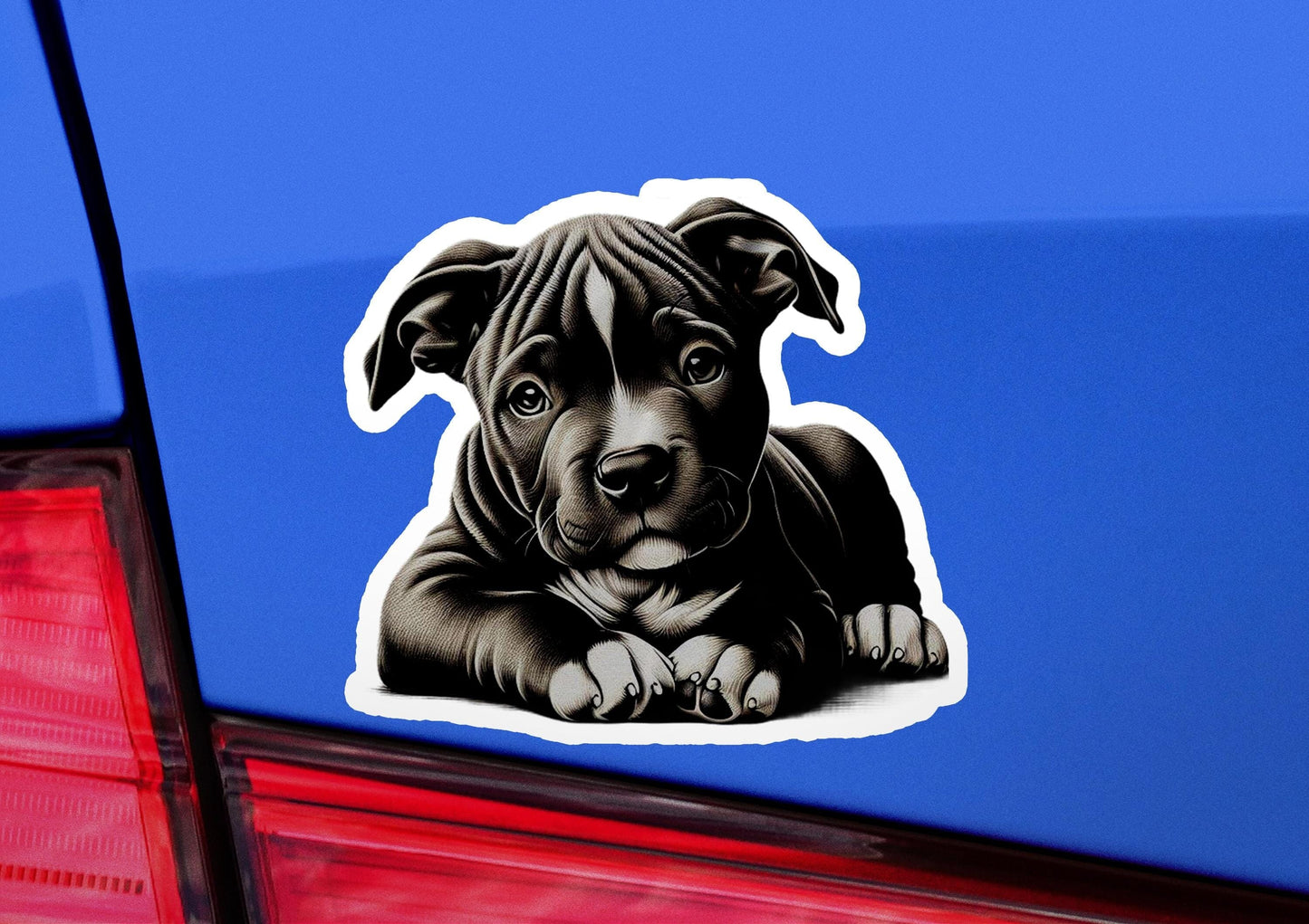a dog sticker on the back of a car