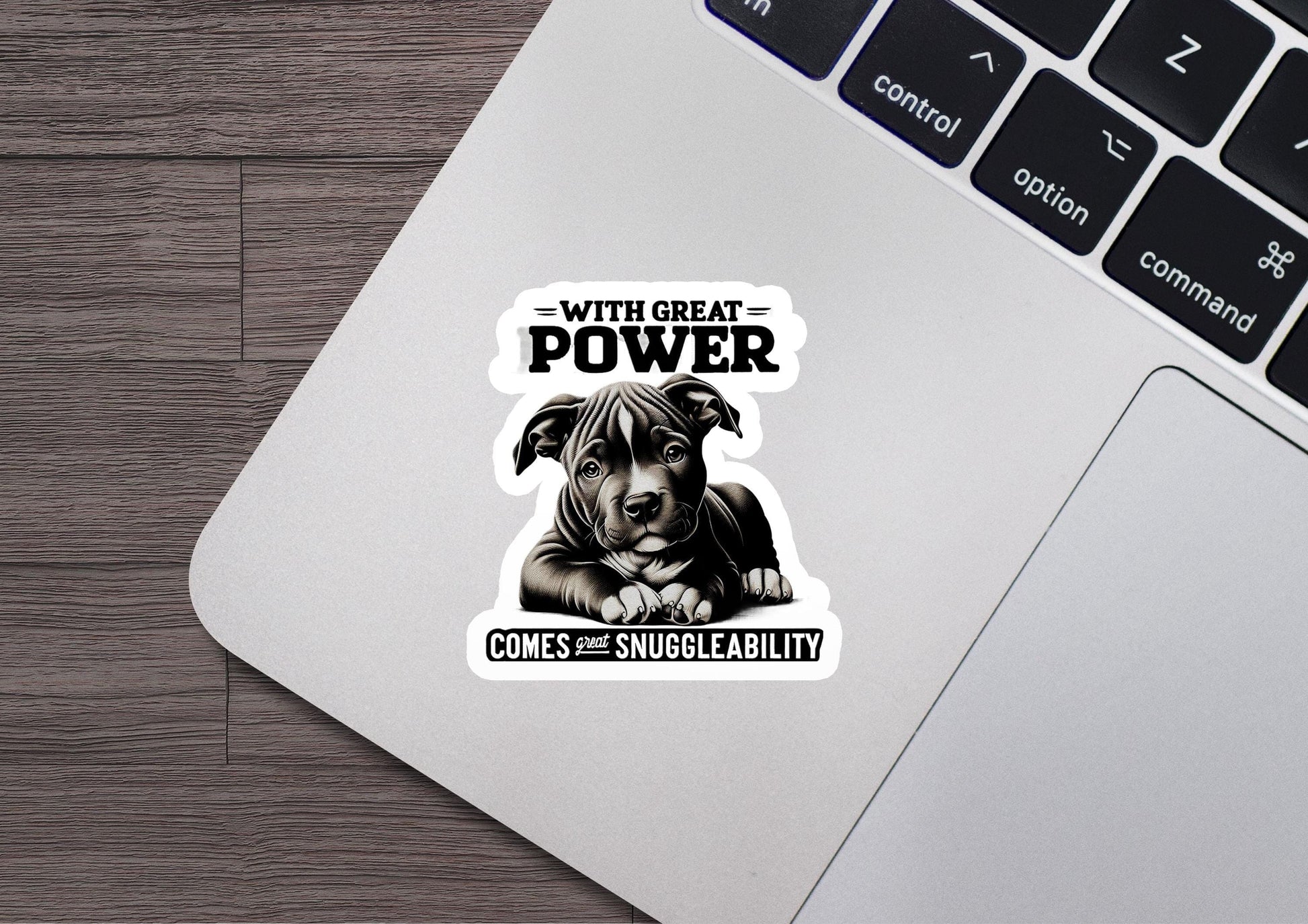 a laptop with a sticker of a dog on it