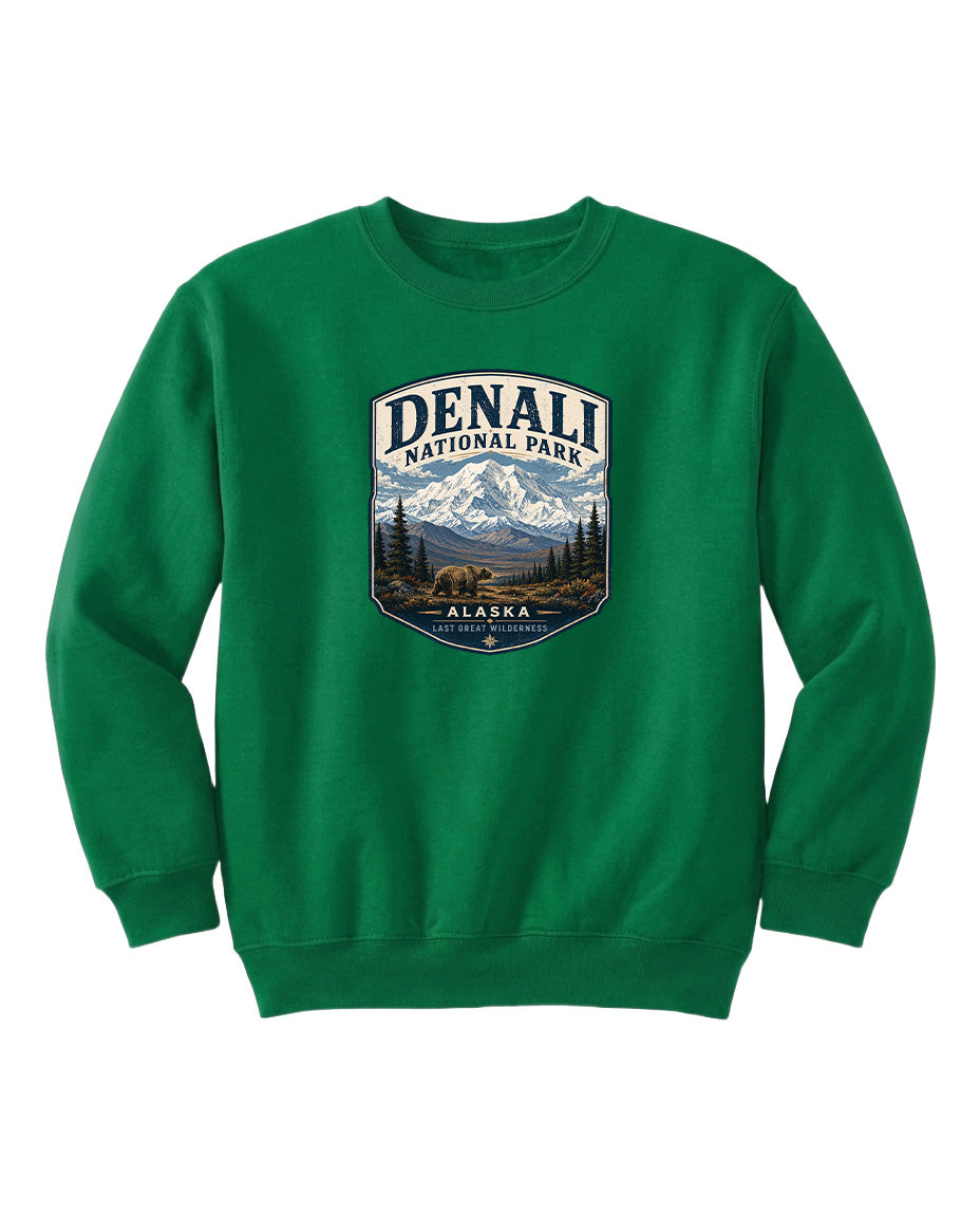 A green sweatshirt with a graphic design featuring a mountain landscape and bears, representing Denali National Park in Alaska.