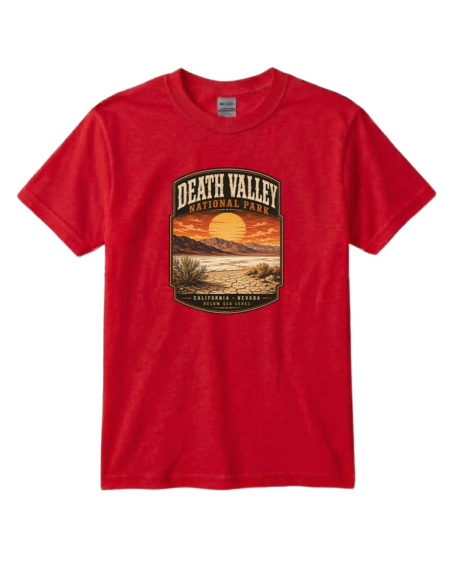 A red t-shirt with a graphic design depicting a sunset over Death Valley National Park, California, Nevada.