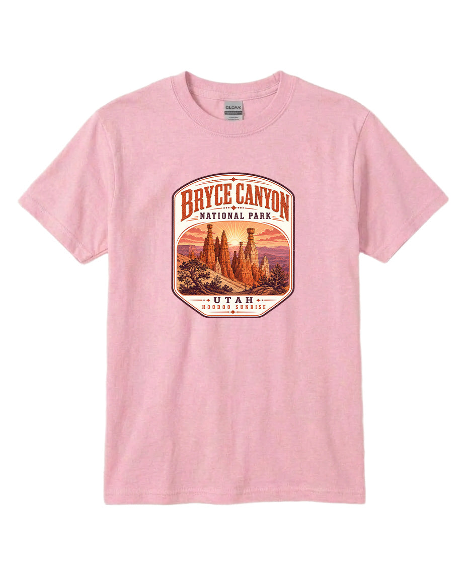 A pink t-shirt with a graphic design depicting the Bryce Canyon National Park in Utah.