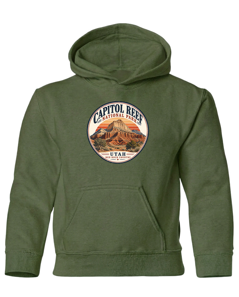 A green hoodie with a circular logo that says "CAPITOL REEF NATIONAL PARK UTAH" printed on it.