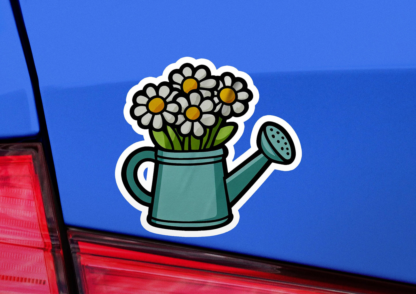 a sticker of a watering can with daisies