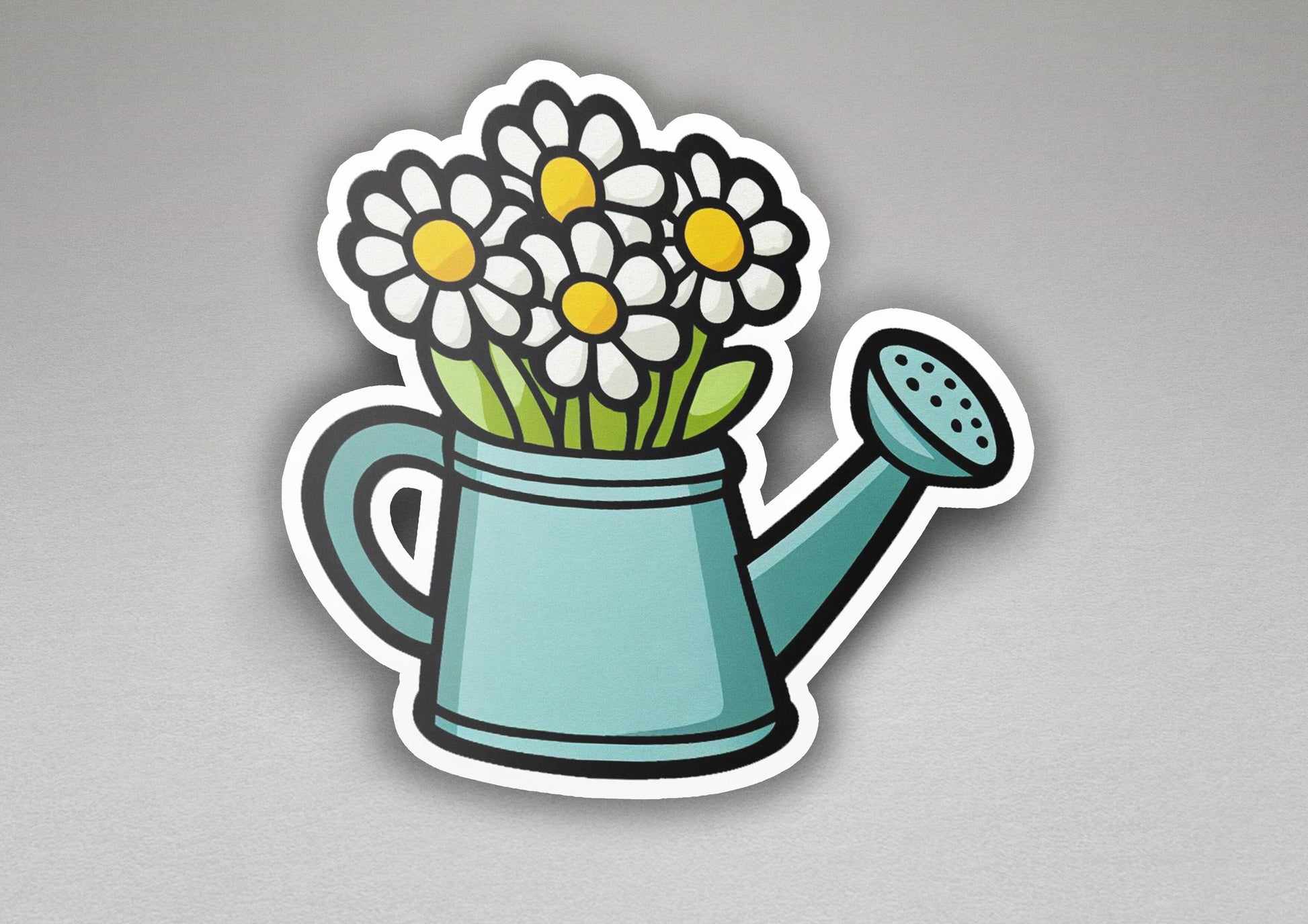 a sticker of a watering can with flowers in it