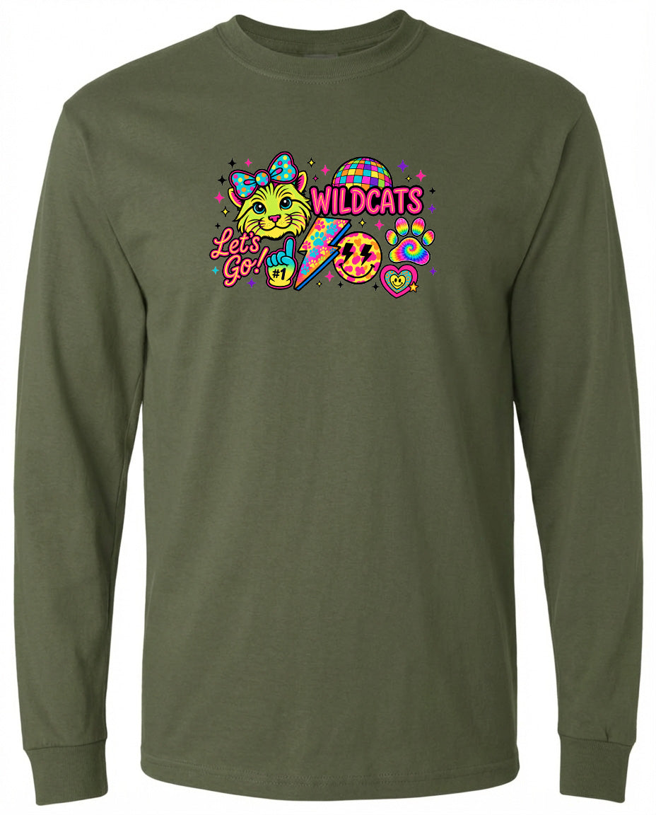 A long-sleeved olive green t-shirt with a colorful graphic design featuring a cartoon cat, a rainbow-colored lightning bolt, and various other whimsical elements.