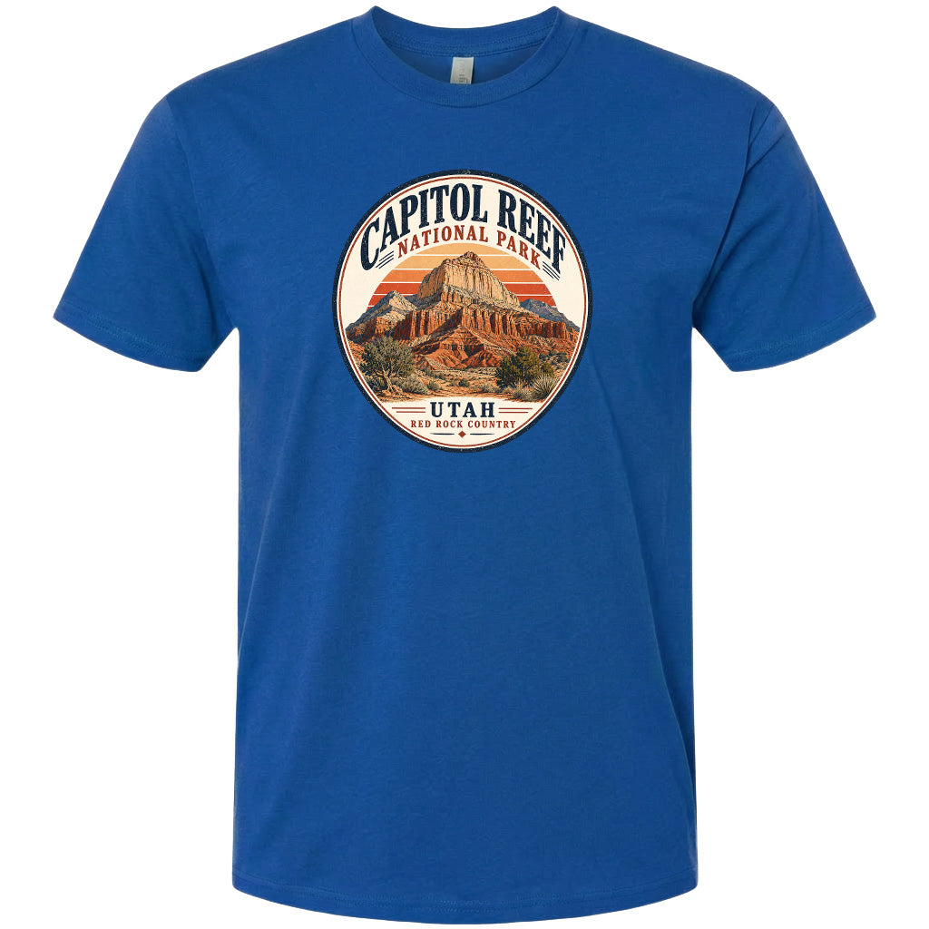 A blue t-shirt with a circular graphic design featuring the Capitol Reef National Park in Utah.