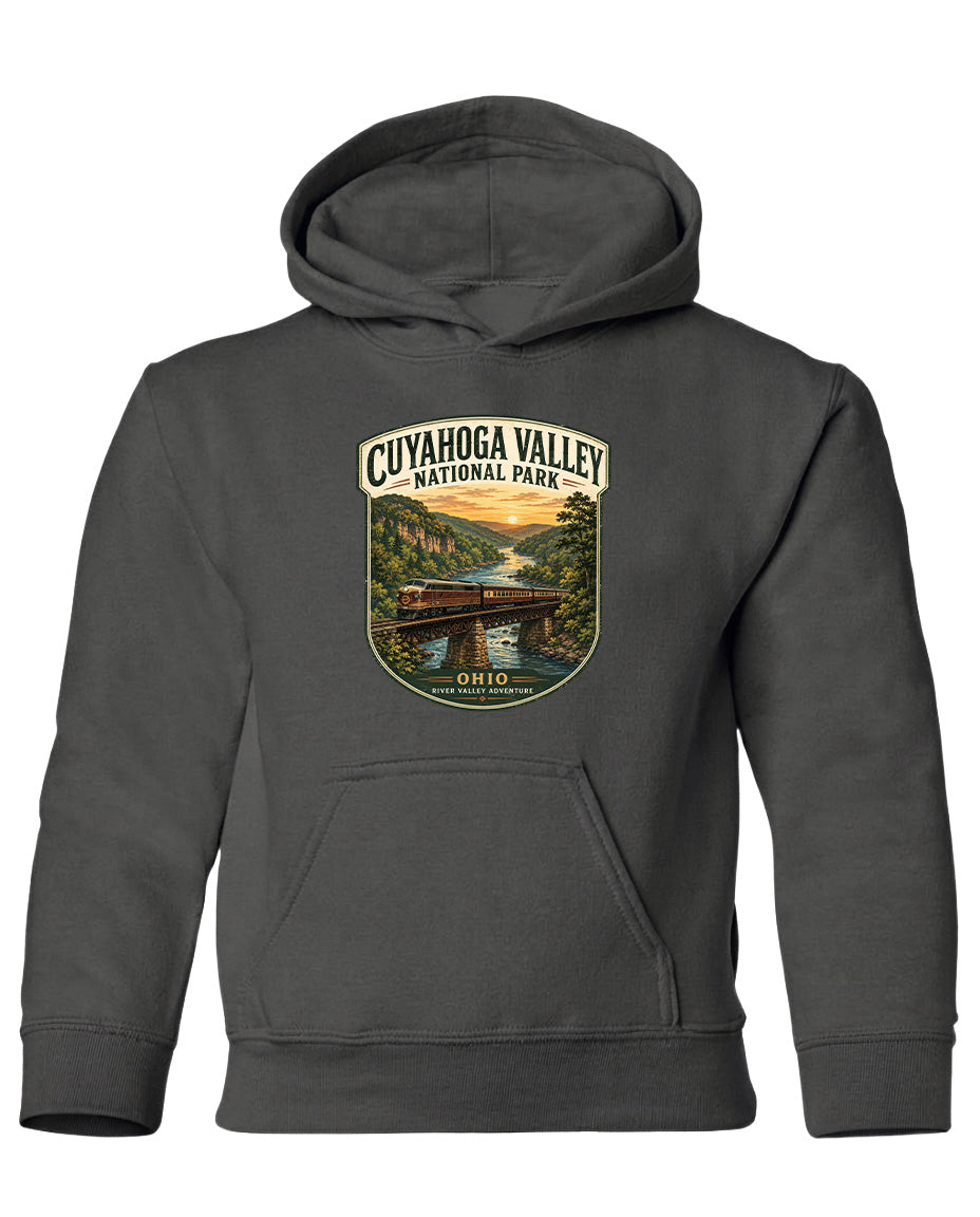 A gray hoodie with a graphic design depicting a scenic view of Cuyaog Valley National Park, featuring a bridge and a river.