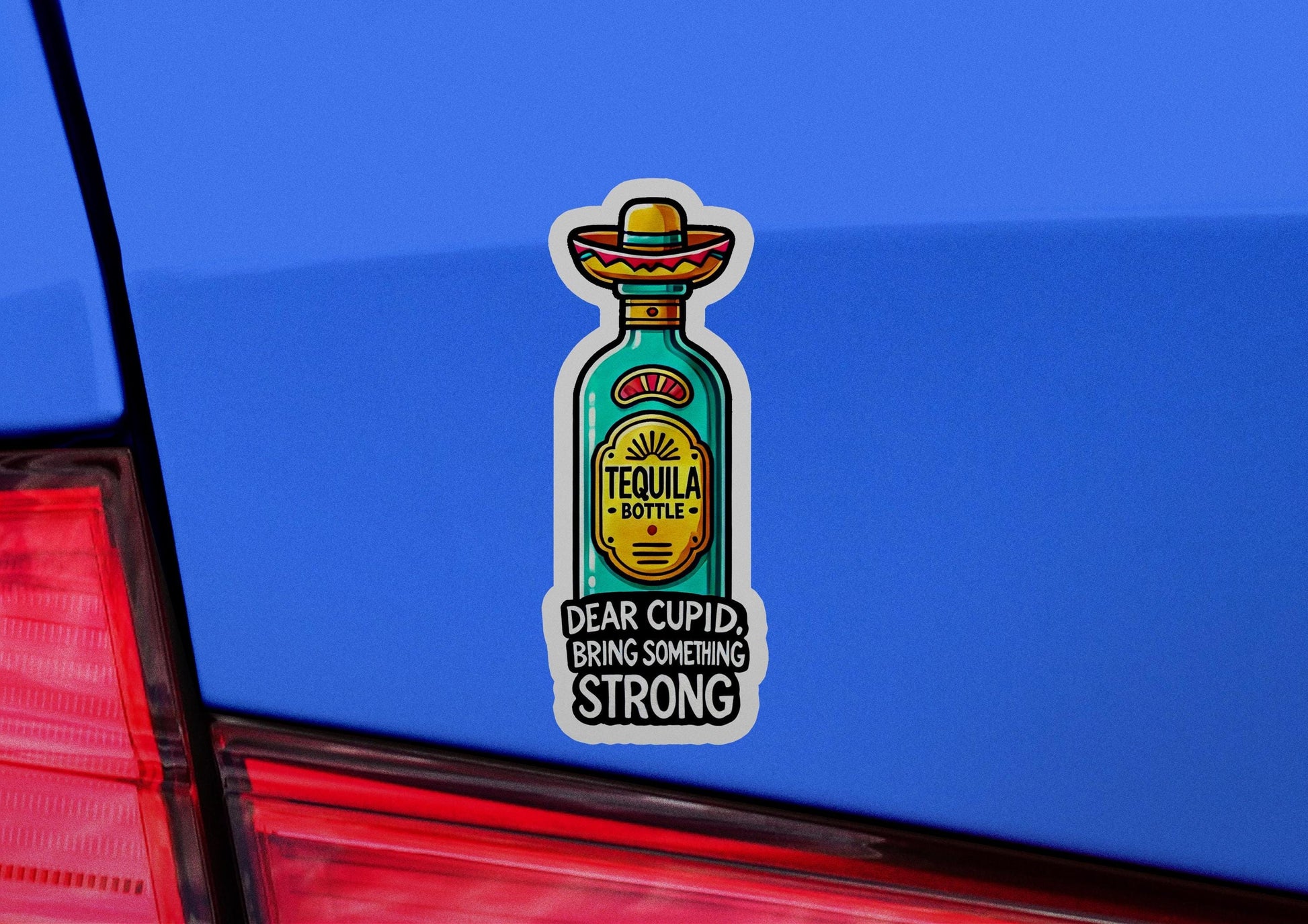 a blue car with a sticker of a bottle of tequila