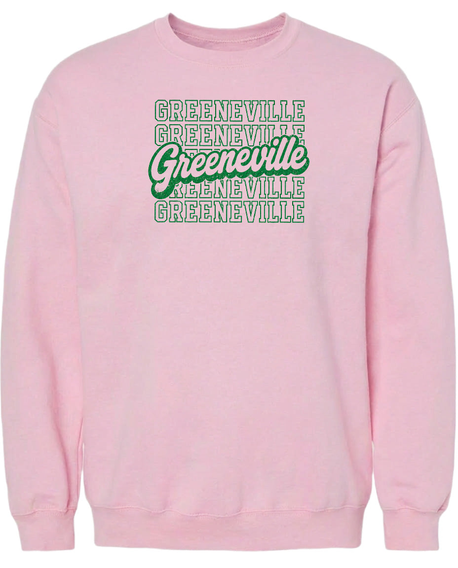 A pink sweatshirt with the text "Greeneville" printed in green and white.