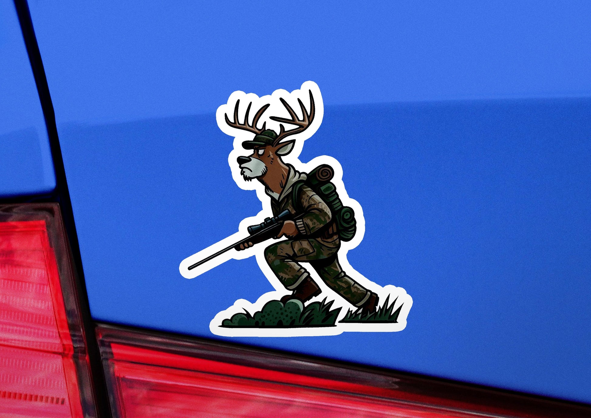 a sticker of a deer hunter with a rifle