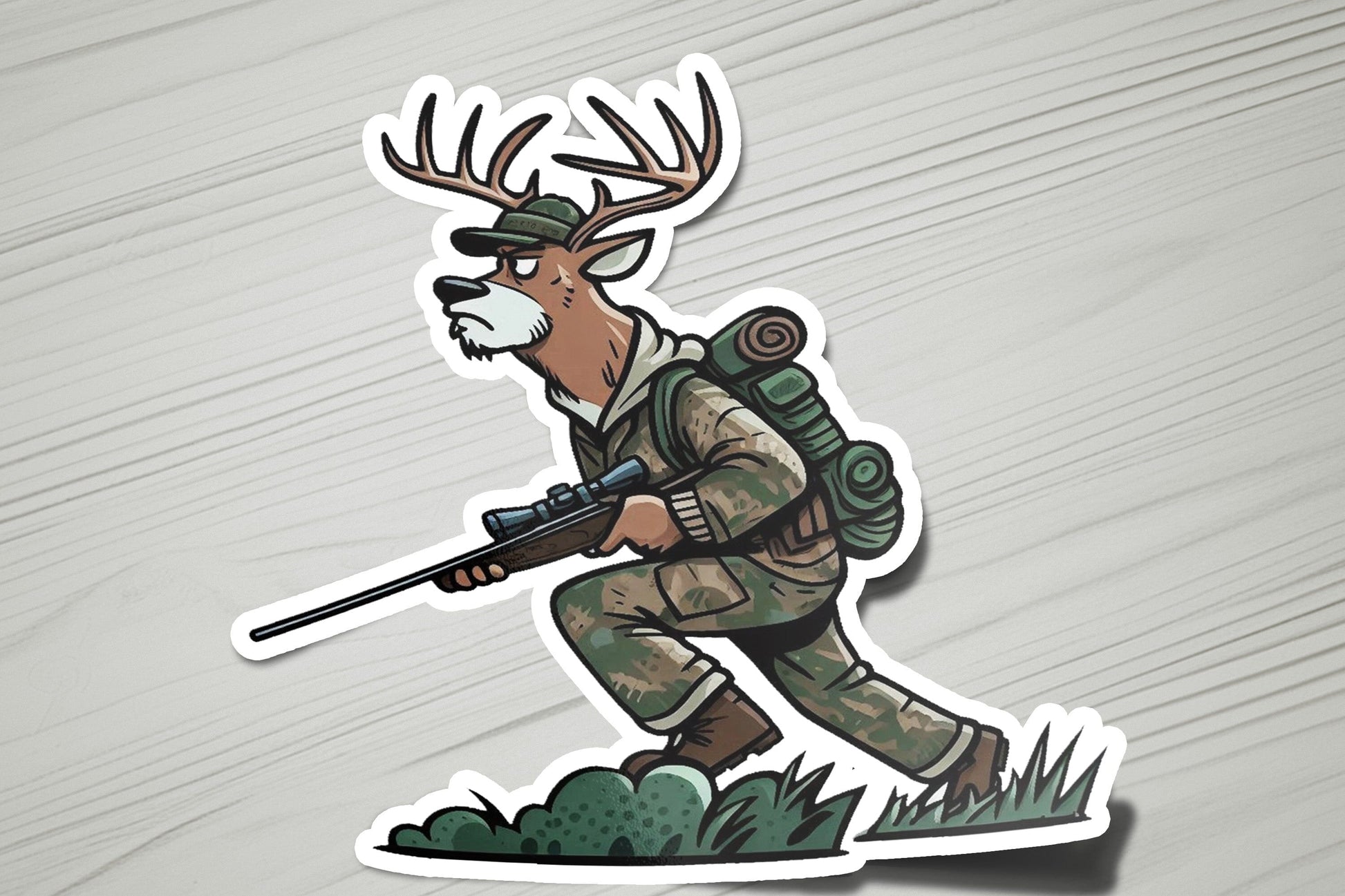 a sticker of a deer hunter with a rifle