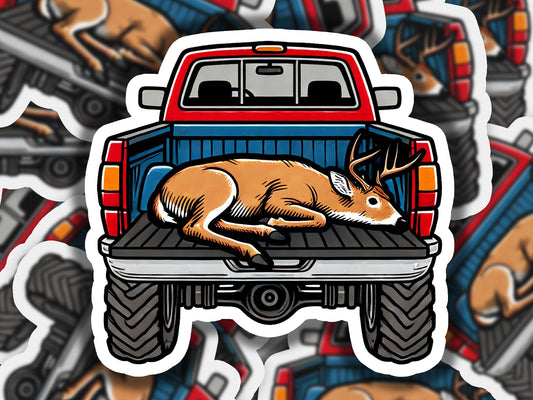 a sticker of a deer laying on the back of a truck