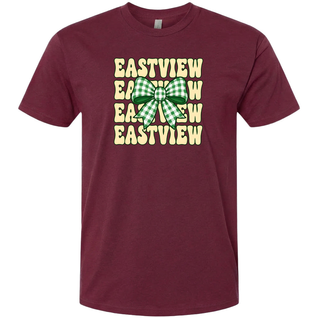 A burgundy-colored t-shirt with a graphic design featuring a green and white checkered bow and the text "EASTVIEW" repeated in a vertical pattern.