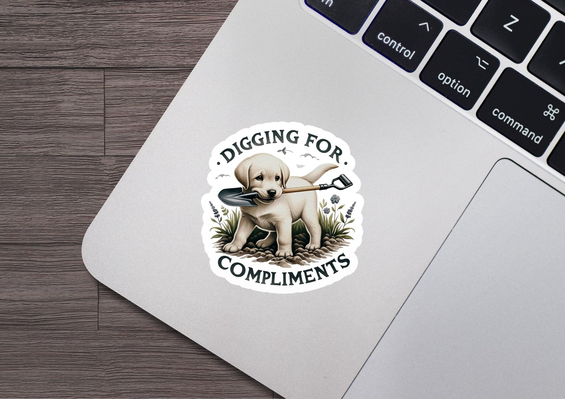 a sticker that says digging for compliments on a laptop