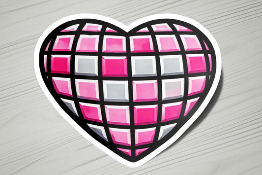 a heart shaped sticker on a wooden surface