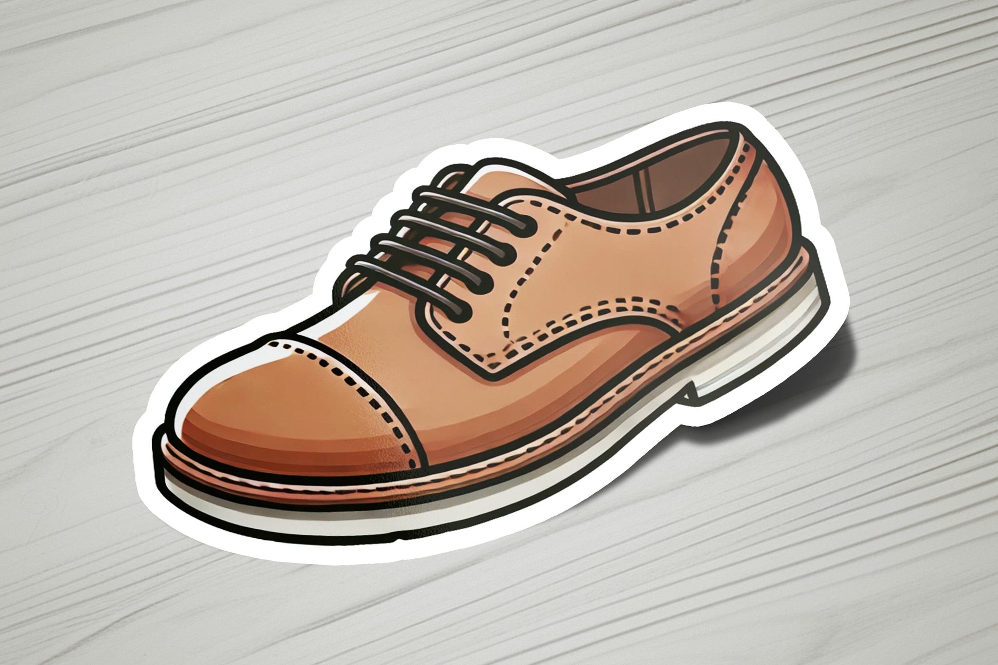 a sticker of a brown shoe on a wooden surface