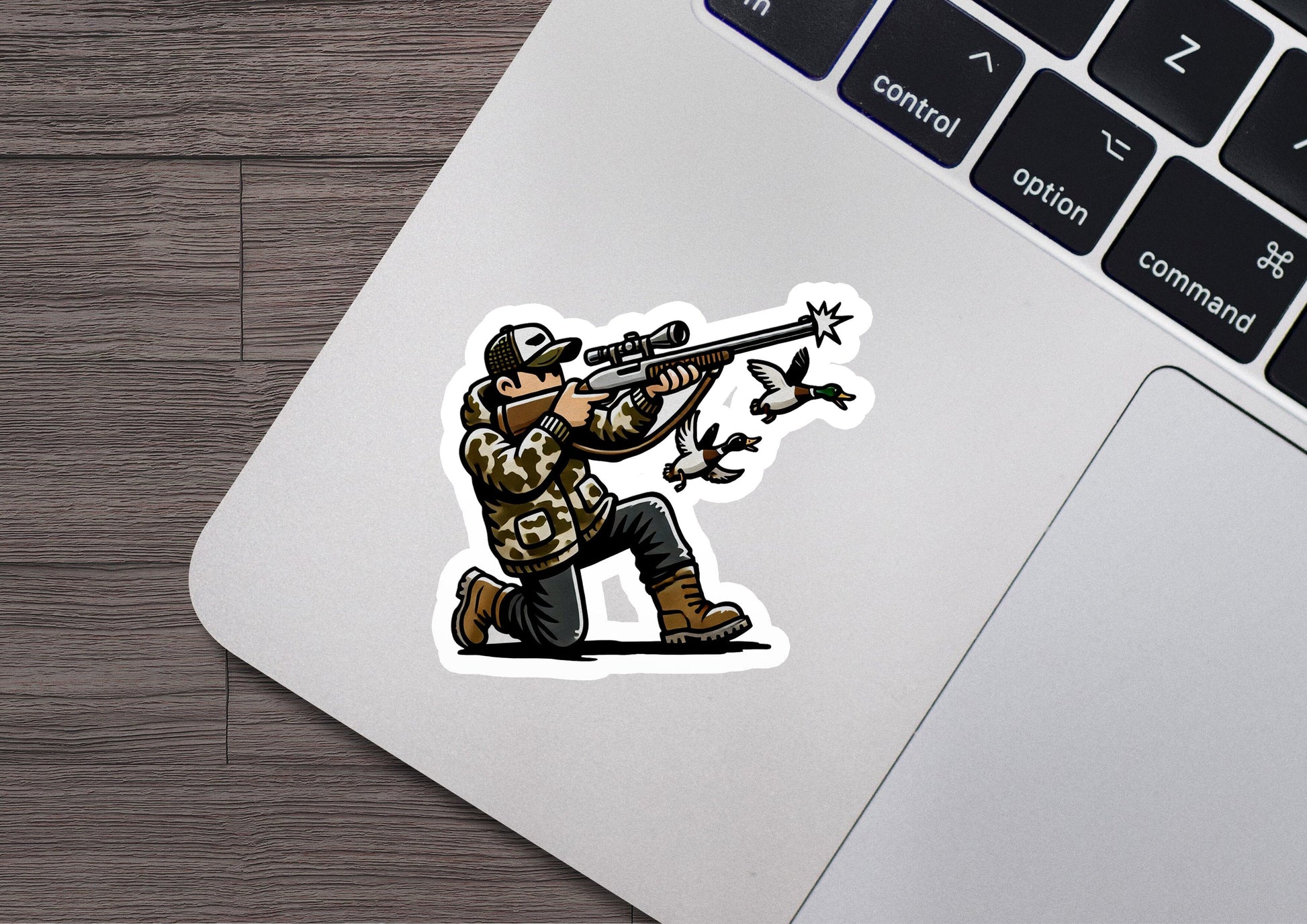 a sticker of a man shooting a bird with a rifle