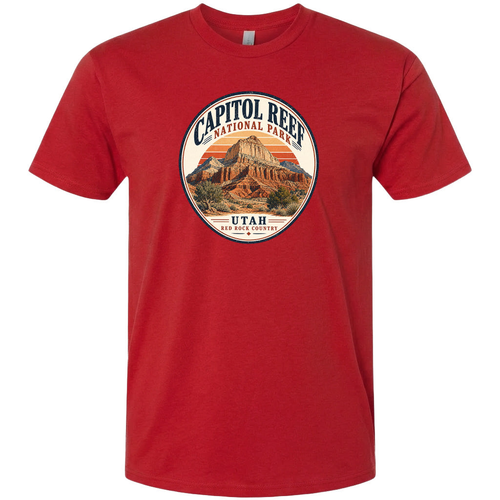 A red t-shirt with a circular graphic design featuring the Capitol Reef National Park in Utah.