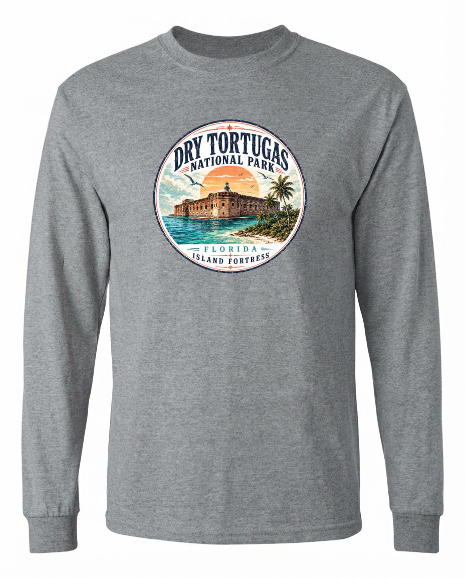 A gray long-sleeved shirt with a circular design featuring a tropical island and a lighthouse, along with the text "Dry Tortugas National Park, Florida Island Fortresses".
