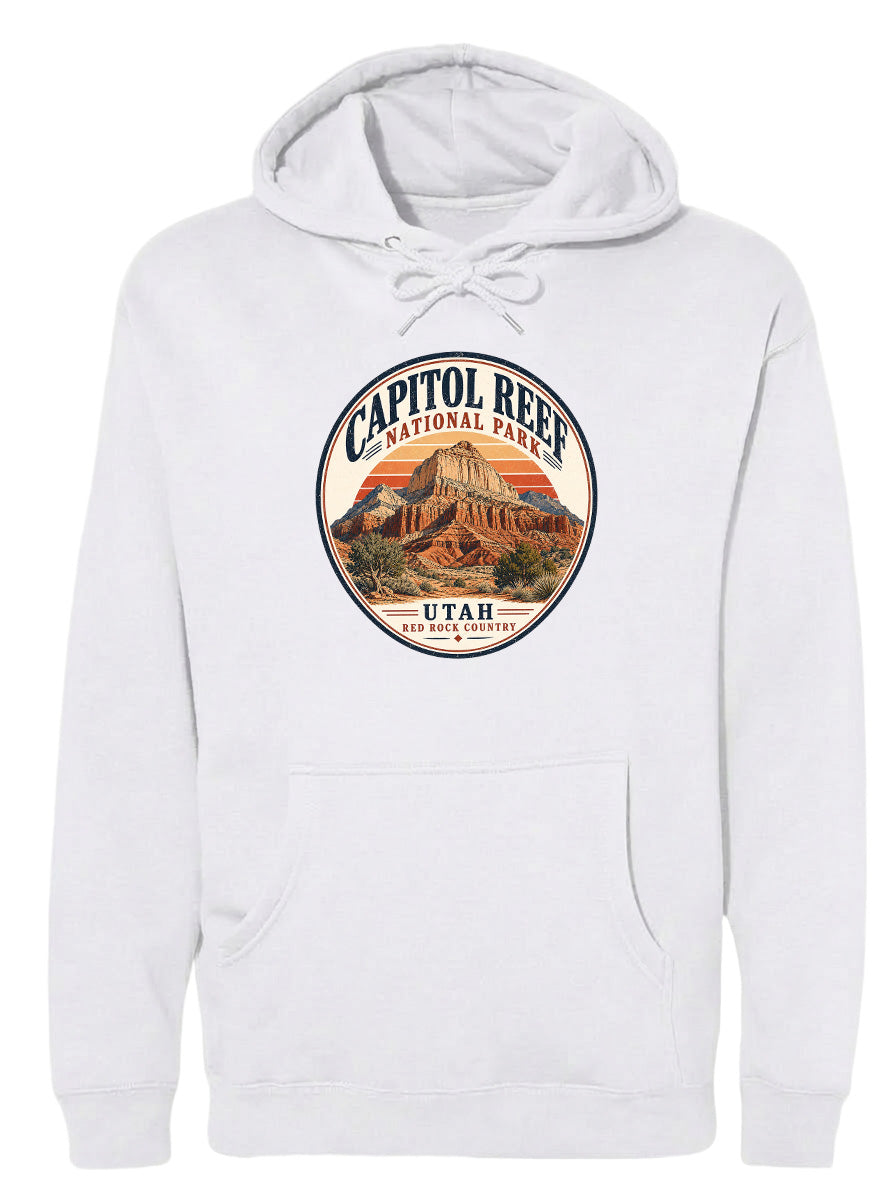 A white hoodie with a circular design featuring the Capitol Reef National Park in Utah.