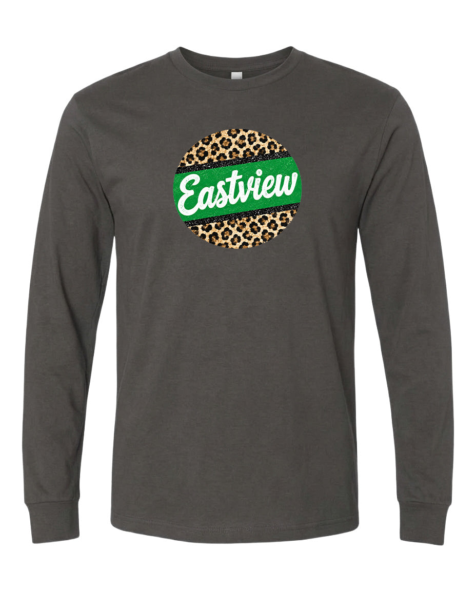 A gray long-sleeved t-shirt with a circular logo on the front. The logo features a green border and a leopard print design.