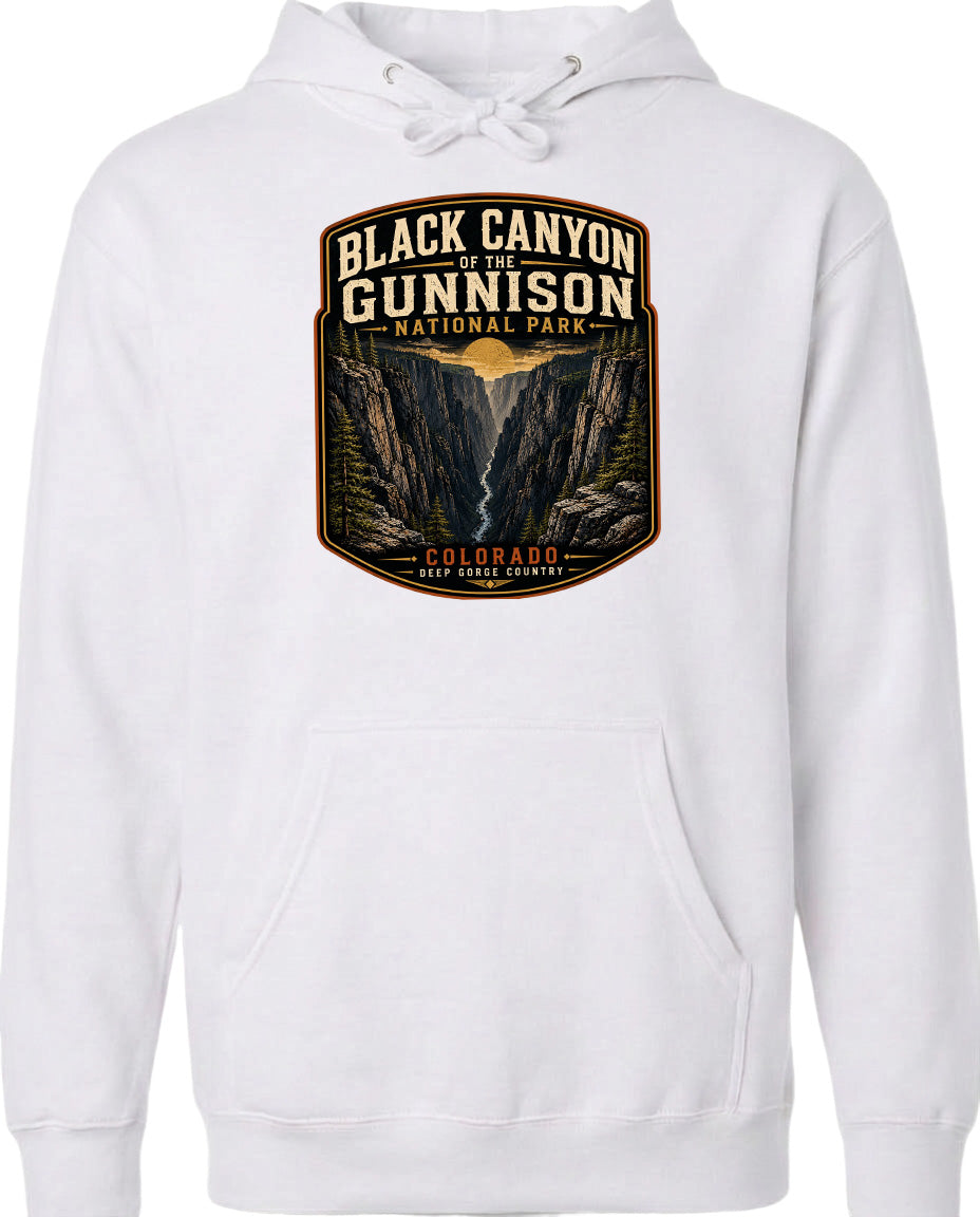 A white hoodie with a graphic design depicting the Black Canyon of the Gunnison National Park in Colorado.