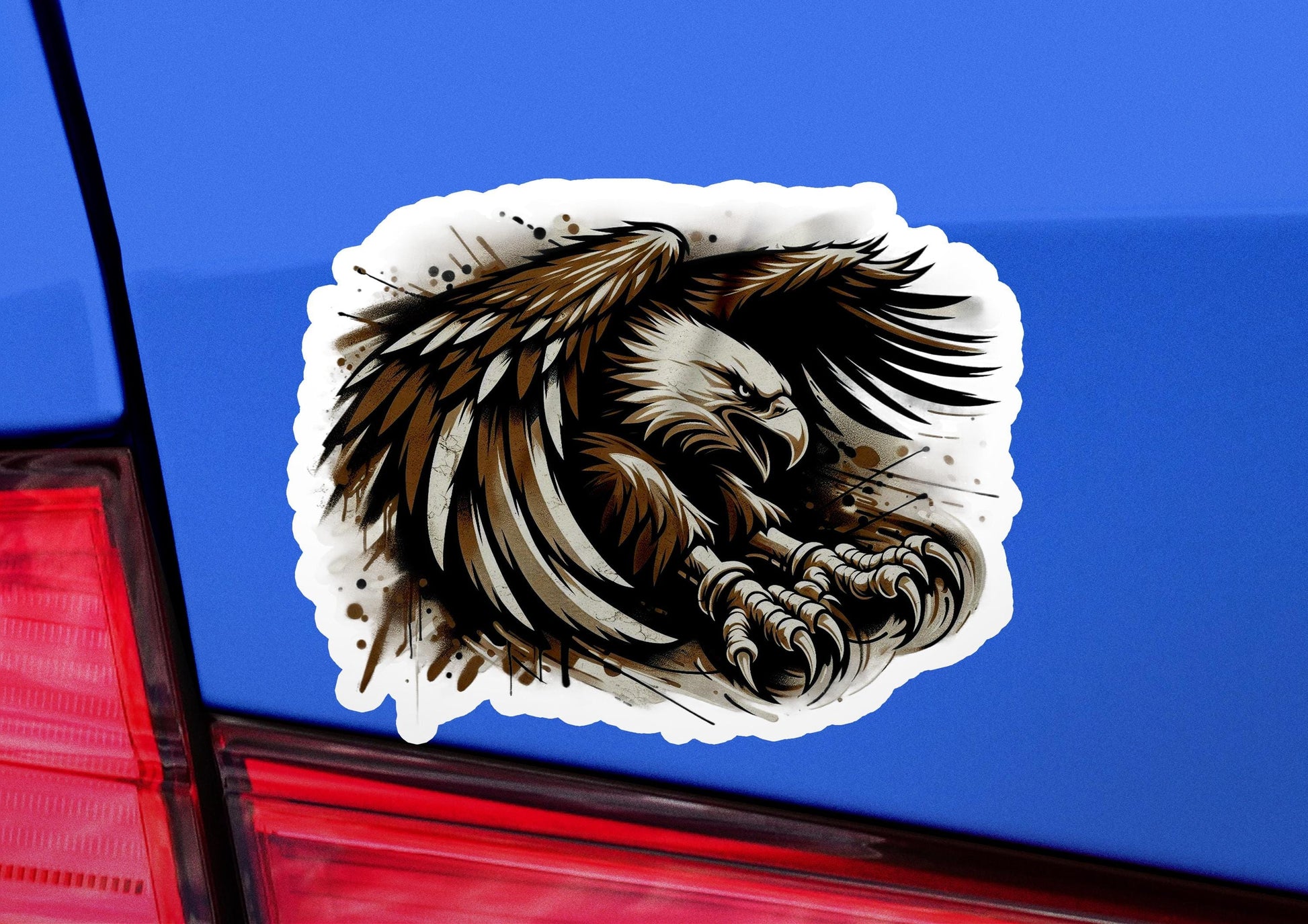 a sticker of an eagle on the back of a car