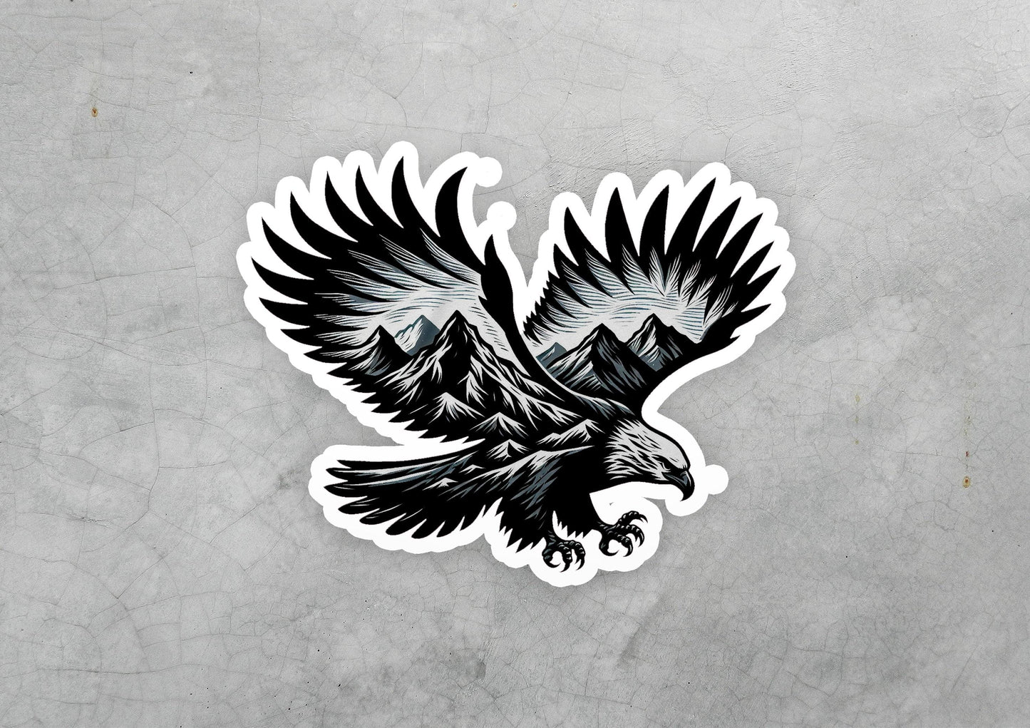 a sticker of an eagle with mountains in the background