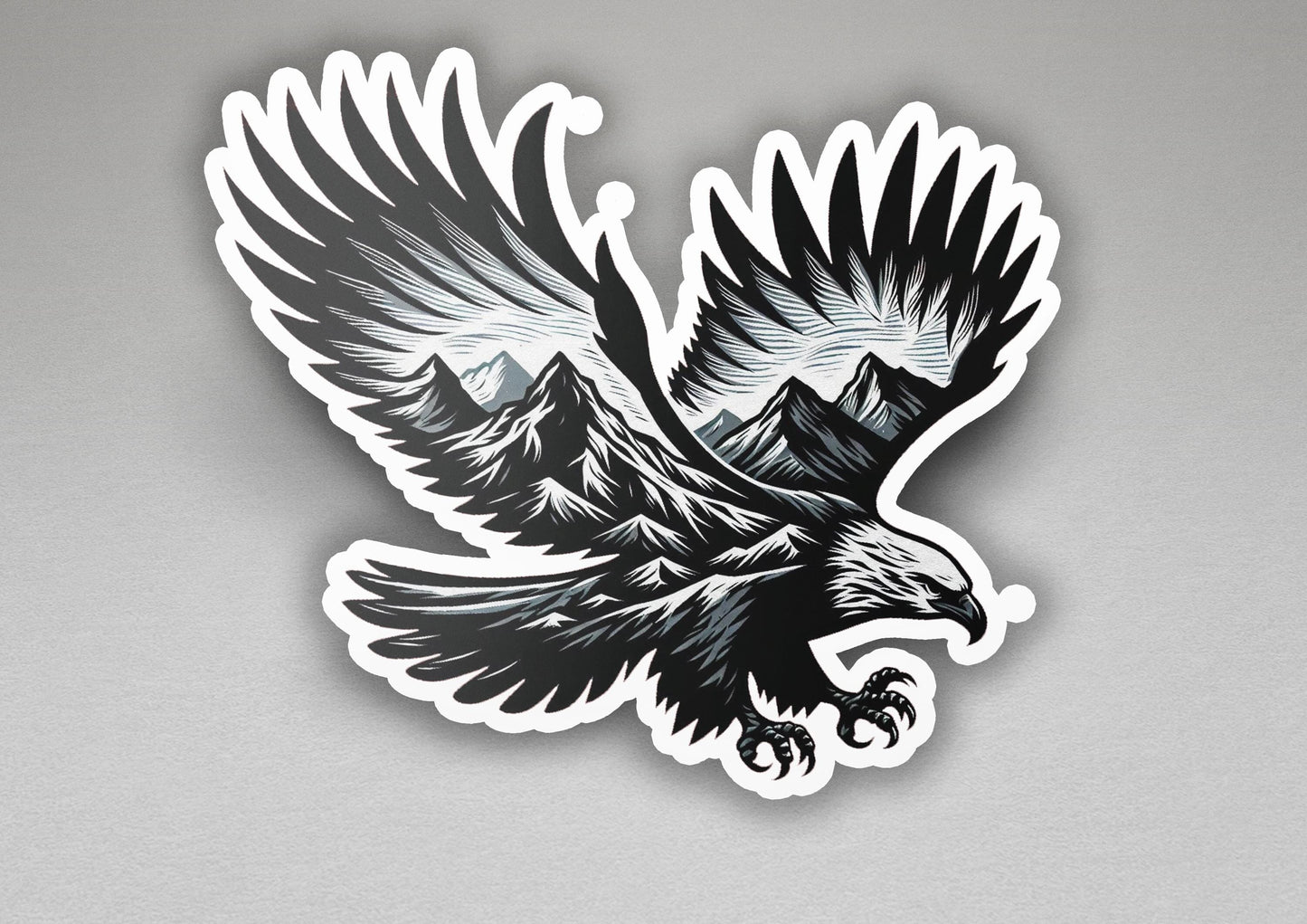 a sticker of an eagle with mountains in the background