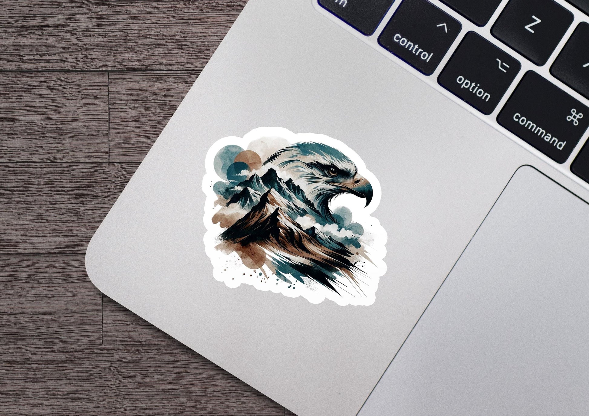 a laptop with a sticker of an eagle on it