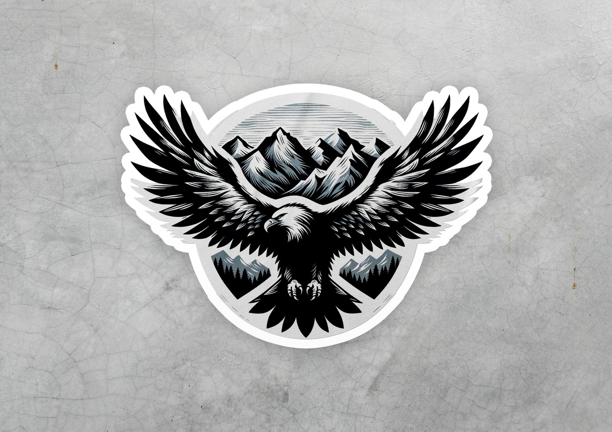 a sticker of an eagle with mountains in the background