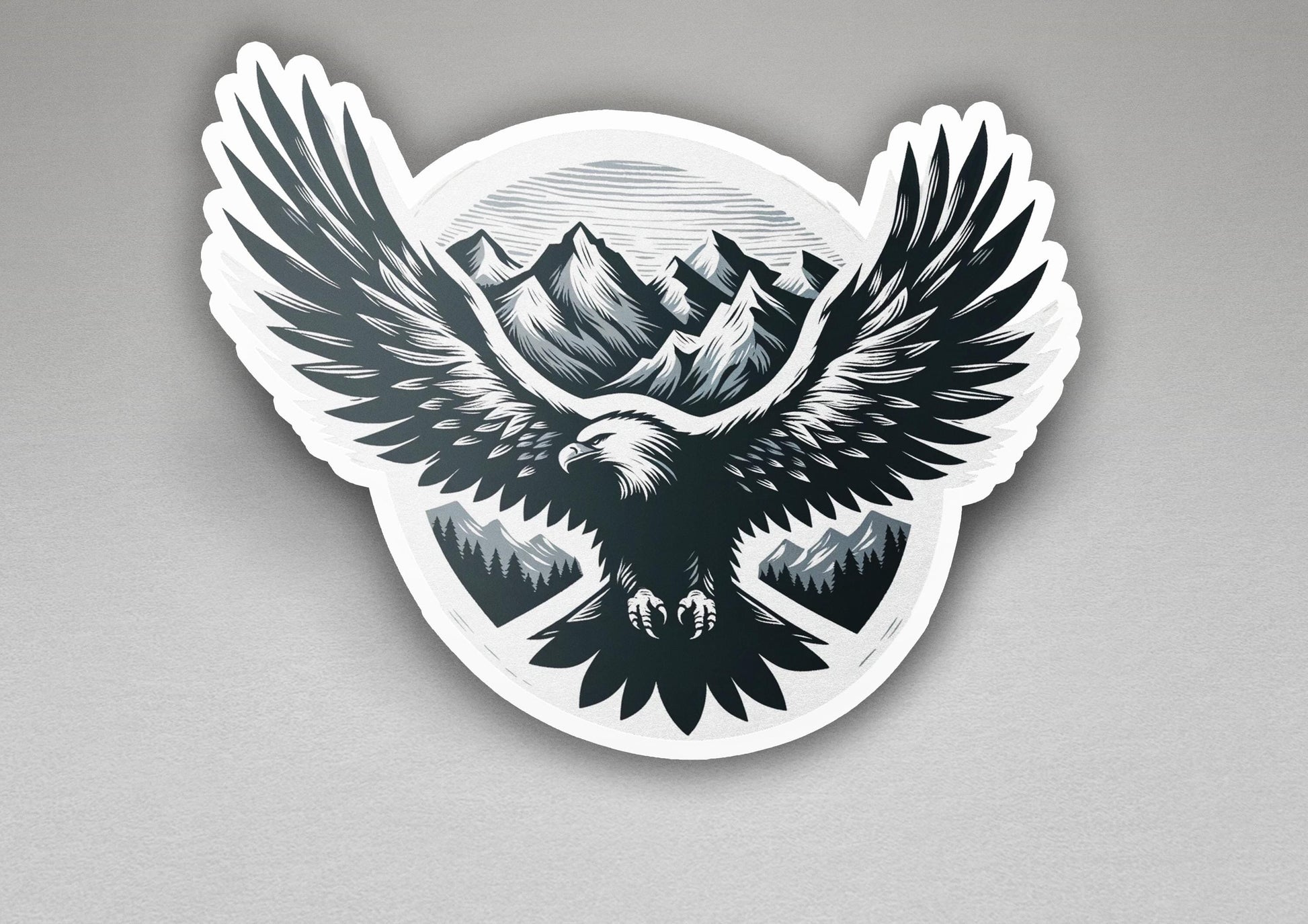 a sticker of an eagle with mountains in the background