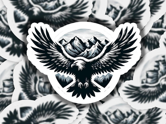 a sticker of an eagle with mountains in the background
