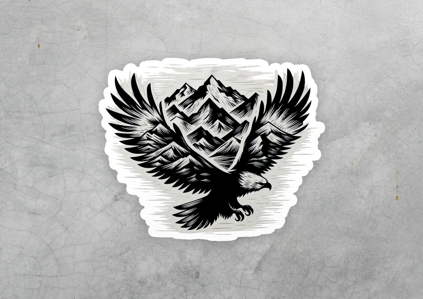 a sticker of an eagle with mountains in the background