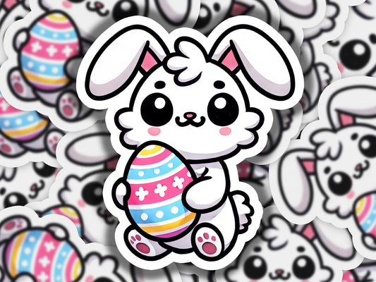 a sticker of a bunny holding an easter egg